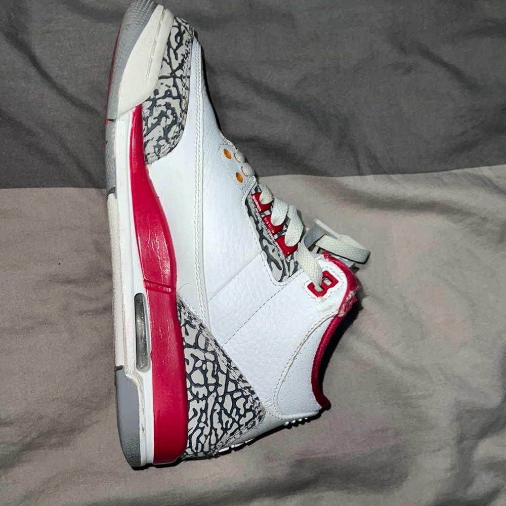 The shoe I am selling is a Air Jordan 3 retro cardinal red, size 5.5y